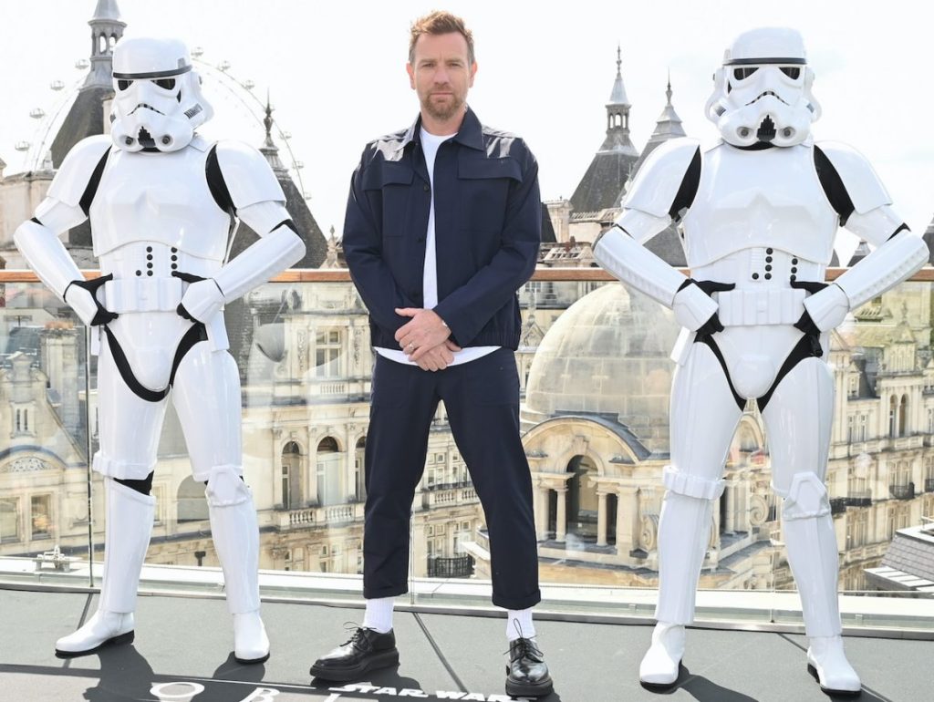 Ewan McGregor poses with stormtroopers as he attends an