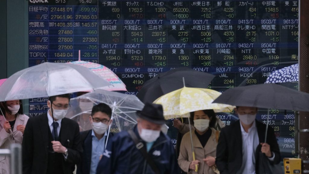 Hongkonger Aktien steigen vor der Zinsentscheidung der Fed gemischt an den asiatischen Märkten
